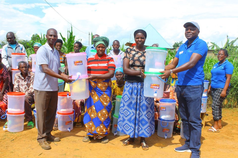 Families receiving water filters through the Clean Water Project