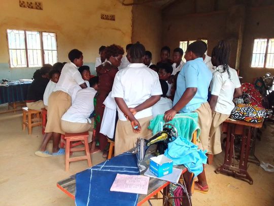 Tailoring students during a practical lesson at Bugesera